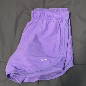 purple nike running shorts